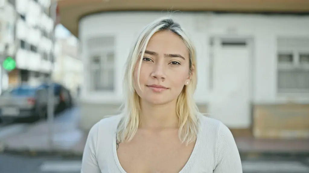 hopeful young woman looking at the camera