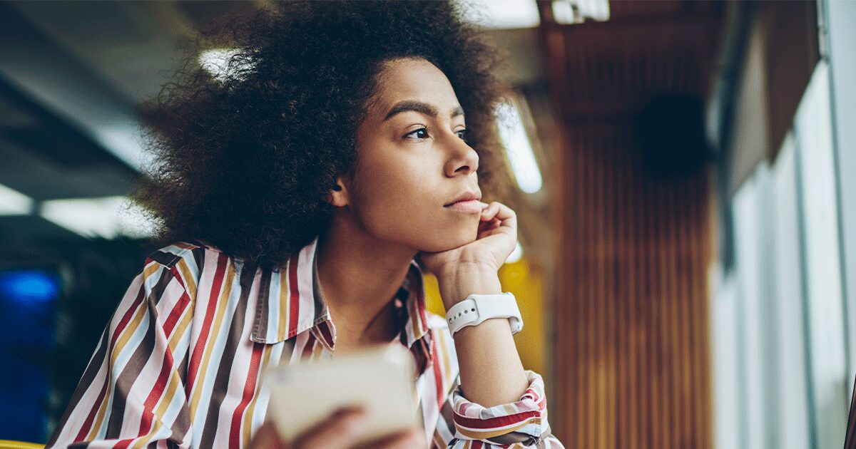 Woman thinking about taking a pregnancy test